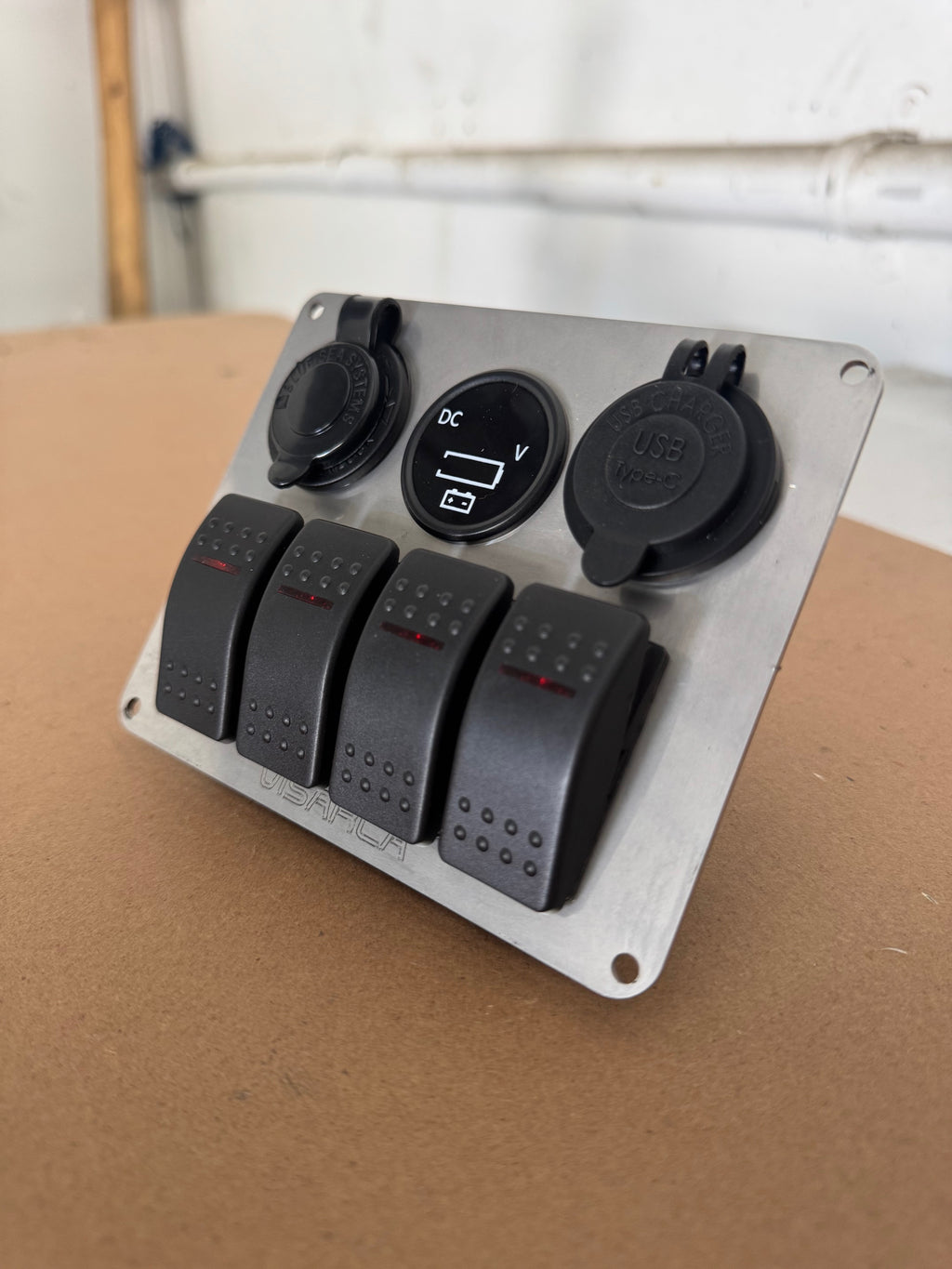 4 Gang rocker switch with 3 socket mounting plate